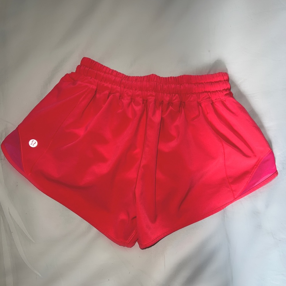 Lululemon running shorts in neon pink